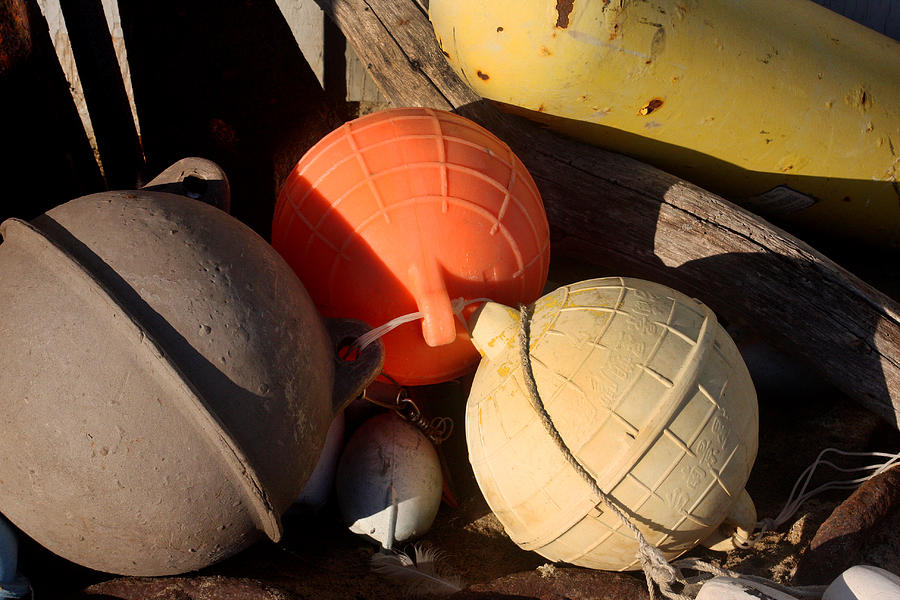 Three Round Buoys Photograph by Art Block Collections