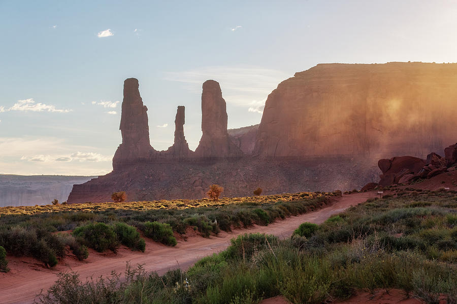 Three Sisters at Monument Valley Photograph by Alex Mironyuk