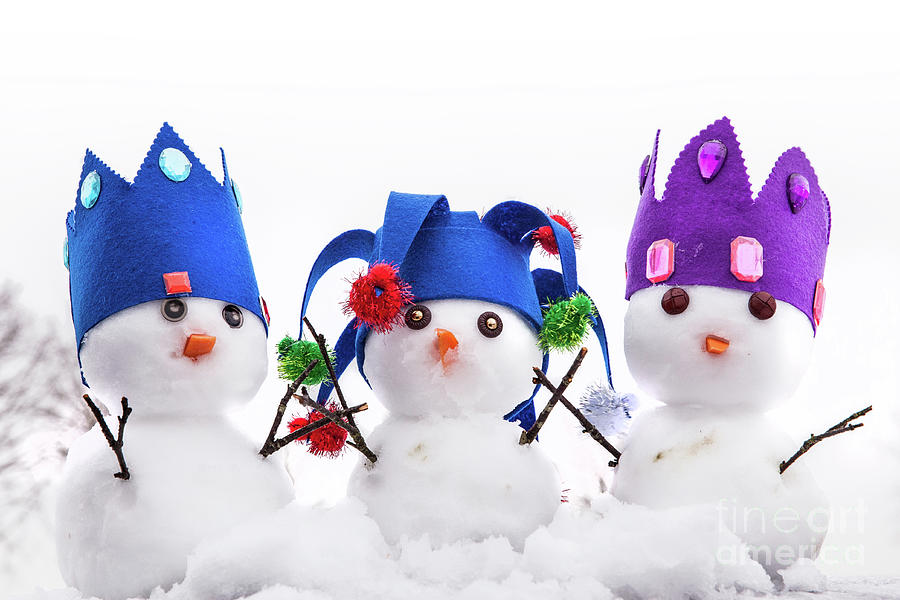 Three snowmen kings dressed with crowns Photograph by Simon Bratt