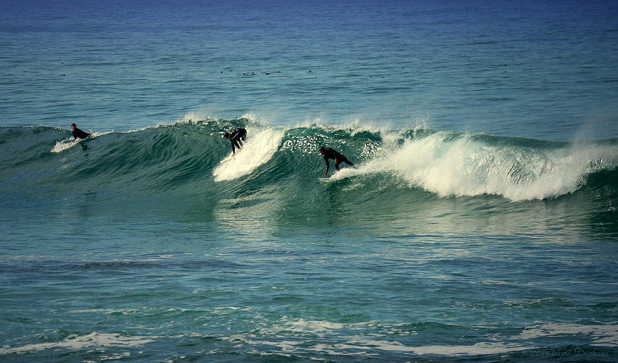 Three Surfers One Wave Photograph by Joyce Dickens