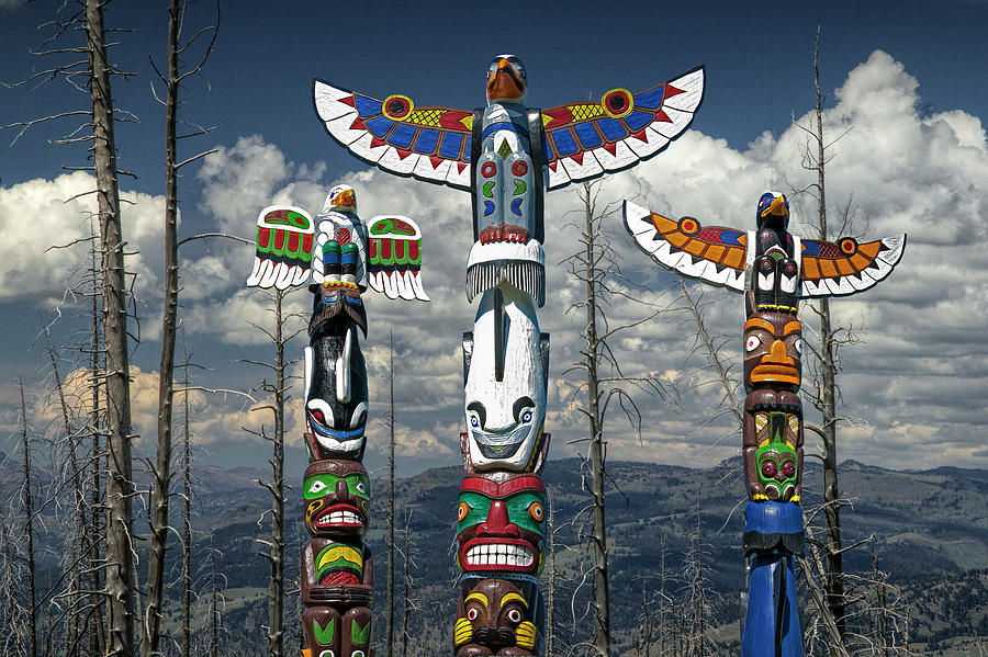 Three Totem Poles in the Northwest Photograph by Randall Nyhof