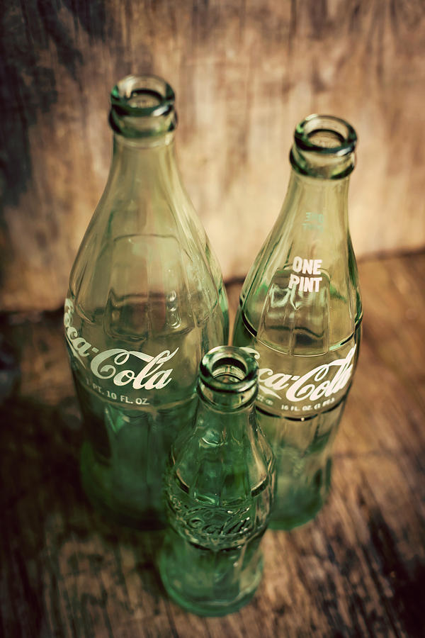 Vintage Photograph - Three Vintage Coca Cola Bottles  by Terry DeLuco