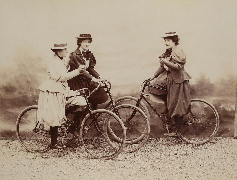 Three Vintage Women On Bicyle Photograph