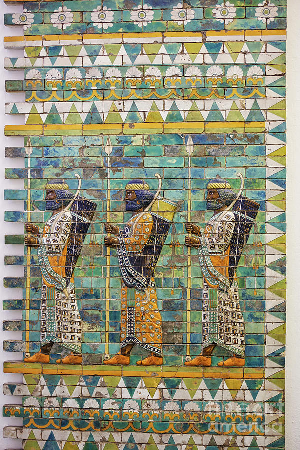 Three warriors on ancient wall from Babylon Photograph by Patricia Hofmeester