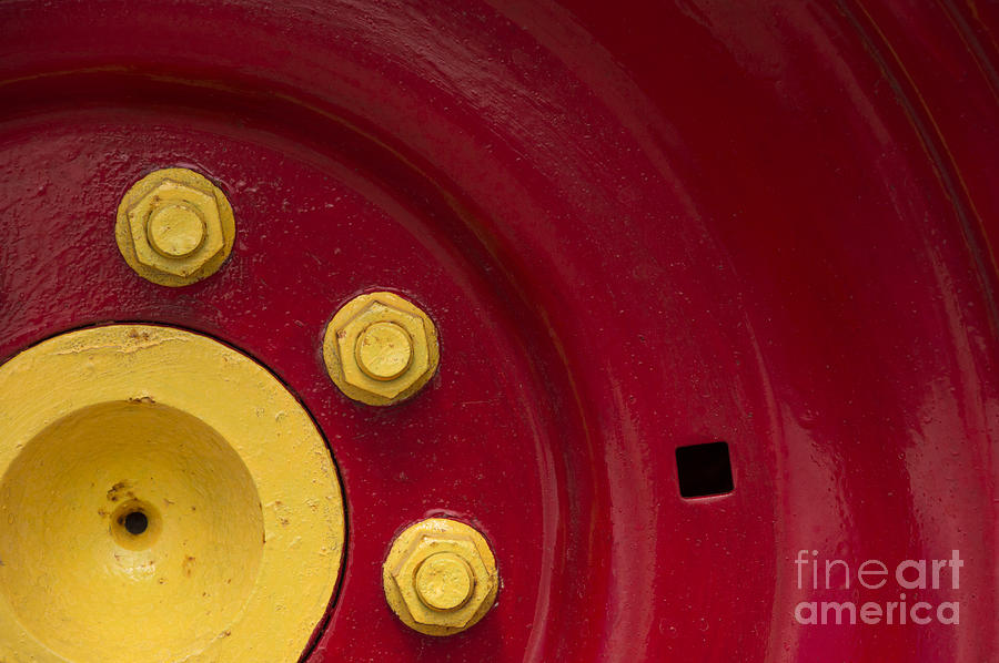 Pattern Photograph - Three Yellow Nuts On A Red Wheel by Wendy Wilton