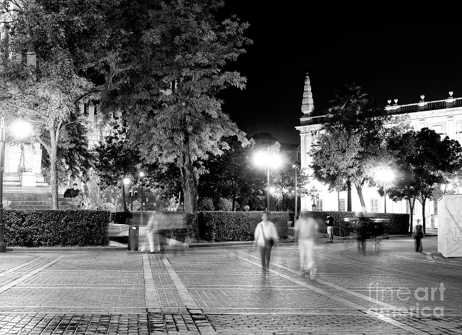 Through Plaza del Triunfo at Night in Seville Photograph by John Rizzuto