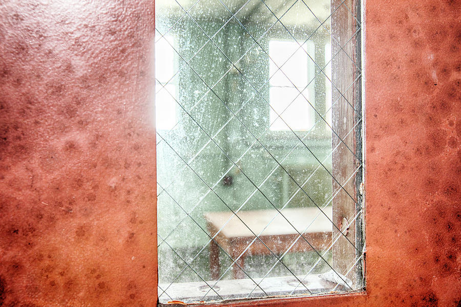 Through the glass window Photograph by Karen Foley