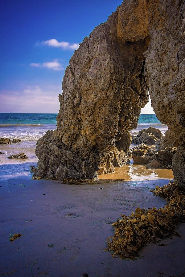 Beach Photograph - Through the Rock Arch by Lynn Bauer