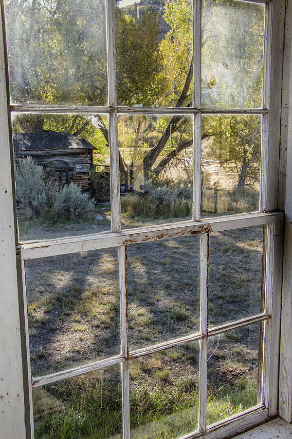 Architecture Photograph - Through the Windows of Bannack 8 by Teresa Wilson