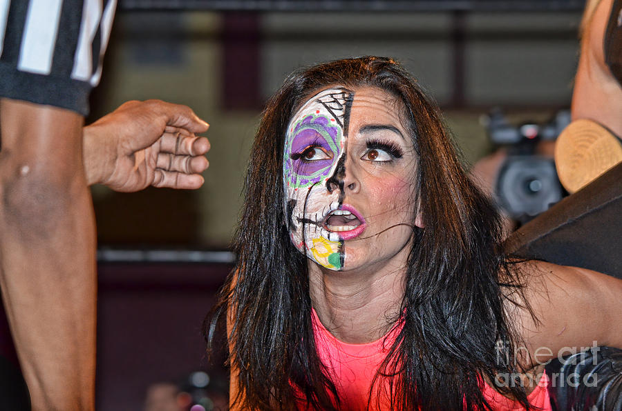 Thunder Rosa Being Questioned by the Ref Photograph by Jim Fitzpatrick