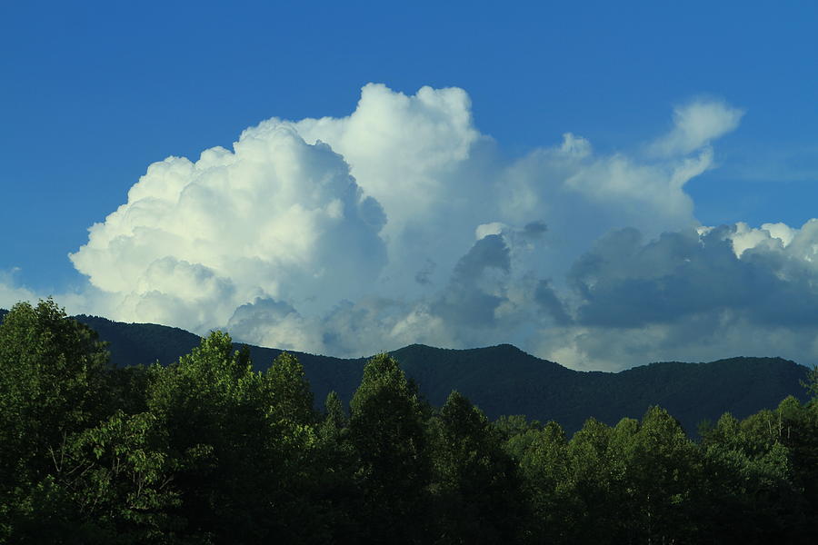 Thunderhead over mountains Photograph by Karen Ruhl