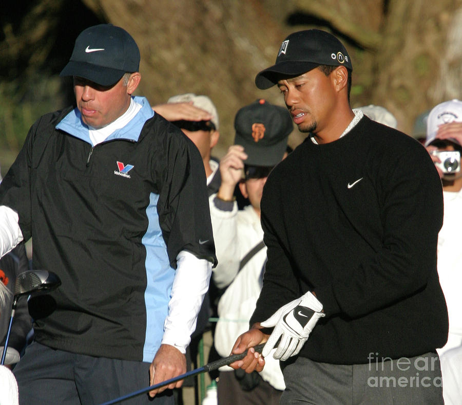Tiger Woods and Caddy  Photograph by Chuck Kuhn