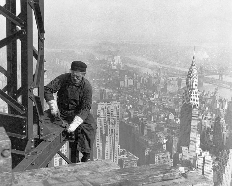 Tightening a bolt on the Empire State Building  New York City 1931 Photograph by David Lee Guss