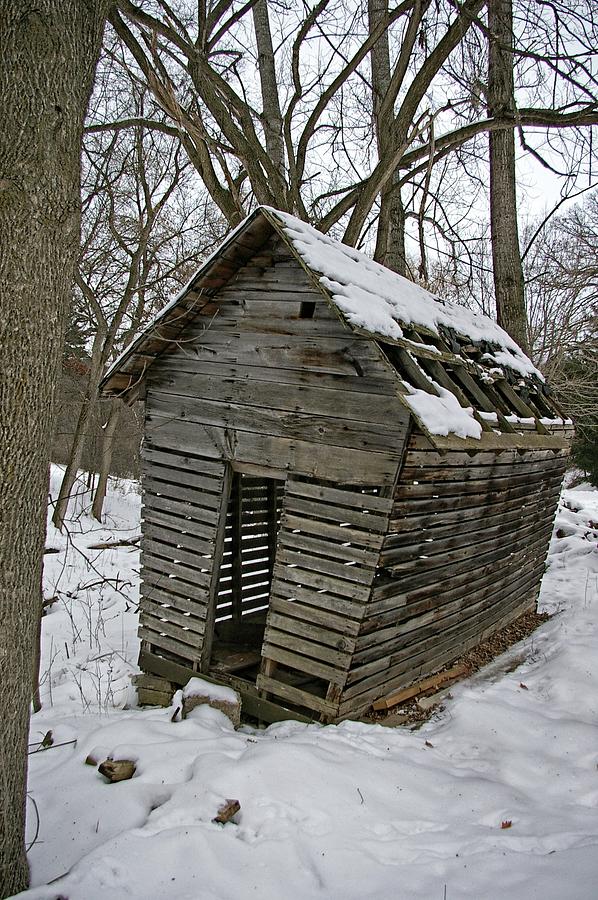 Winter Photograph - Tilting Shed by Tom Reynen