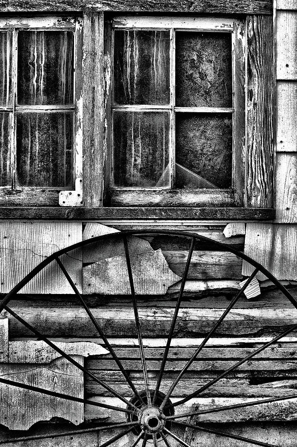 Time Worn House and Wagon Wheel Photograph by Mitch Spence
