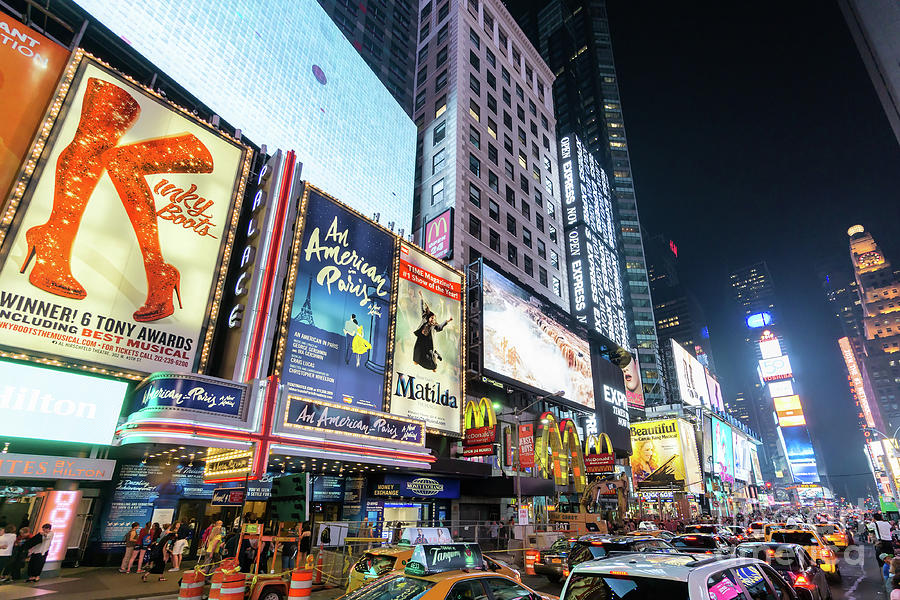 Times Square at night featuring lighted billboards of the broadway best ...