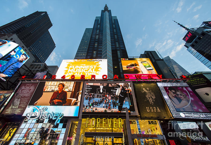 New York times Square broadway view of street showing adverts disney forever  21 twenty one Stock Photo - Alamy
