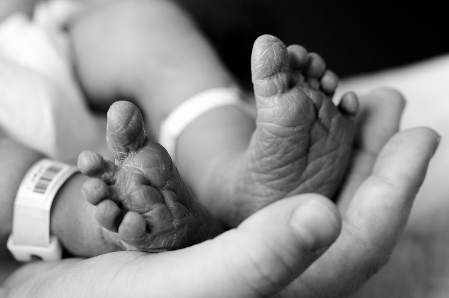 Black And White Photograph - Tiny Feet by Sebastian Musial