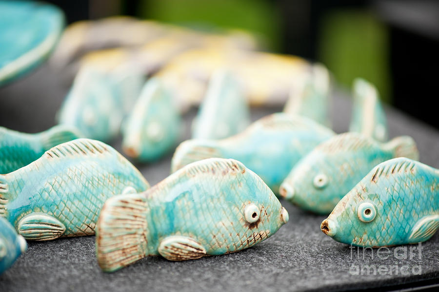 Tiny fish ceramic decorations Photograph by Arletta Cwalina