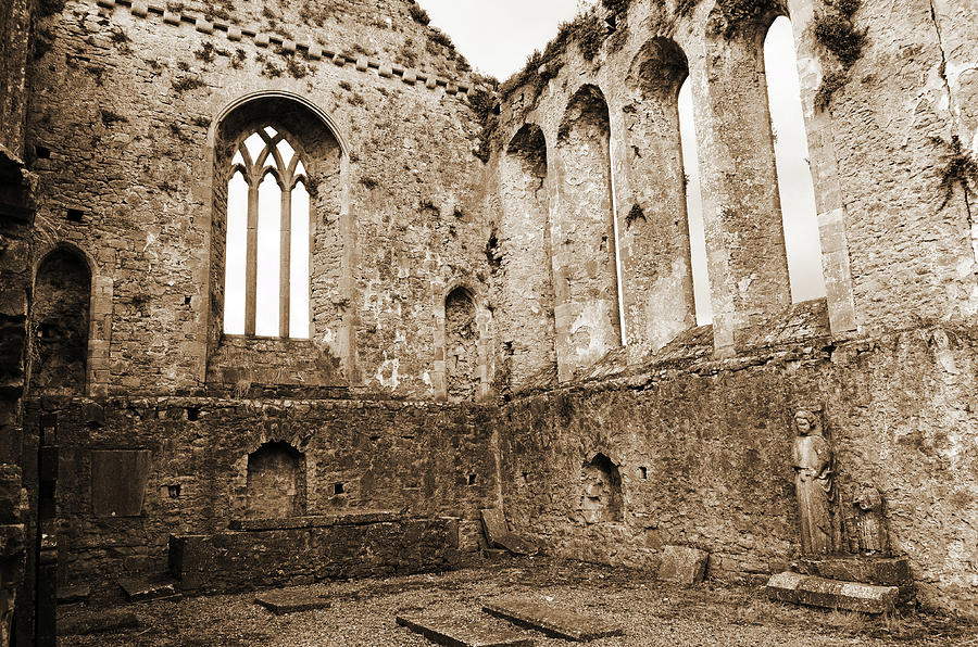 Tipperary Ireland Athassel Priory Medieval Ruins Lancet Windows and St Joseph Statue Sepia Photograph by Shawn OBrien