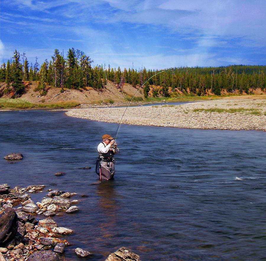 Tom Lands a Snake River Whitefish Photograph by Joe Duket