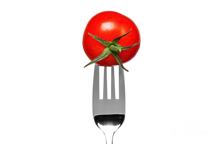 Tomato On A Fork Isolated On White Photograph
