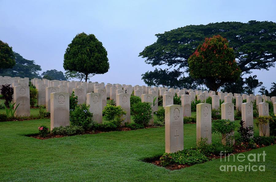 Tombstones of soldiers at Kranji Commonwealth War Cemetery graveyard Singapore Photograph by Imran Ahmed
