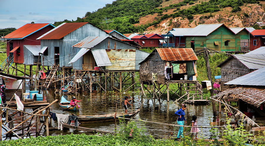 Tonle Sap Boat Village Cambodia Photograph by Chuck Kuhn