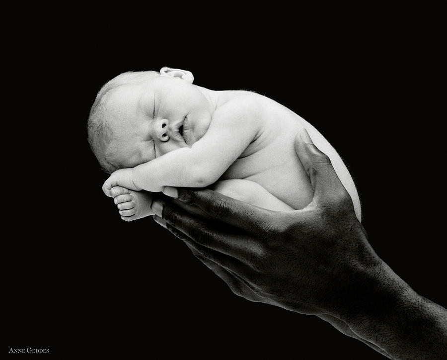 Black And White Photograph - Tony holding Georgia by Anne Geddes