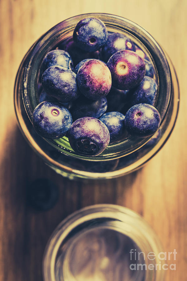 Top down view of ripe blueberries in a jar Photograph by Jorgo Photography