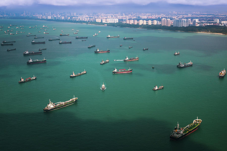 Top view from airplane of Singapore harbor with transportation boat ...