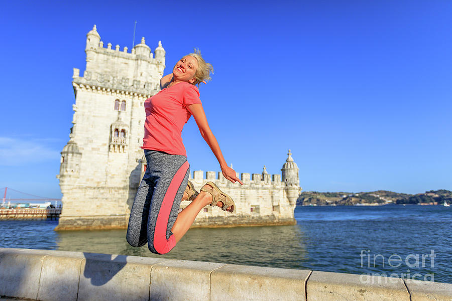 Torre de Belem jumping Photograph by Benny Marty