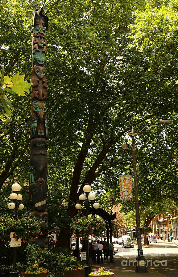 Totem Pole At Pioneer Square Photograph by Christiane Schulze Art And Photography