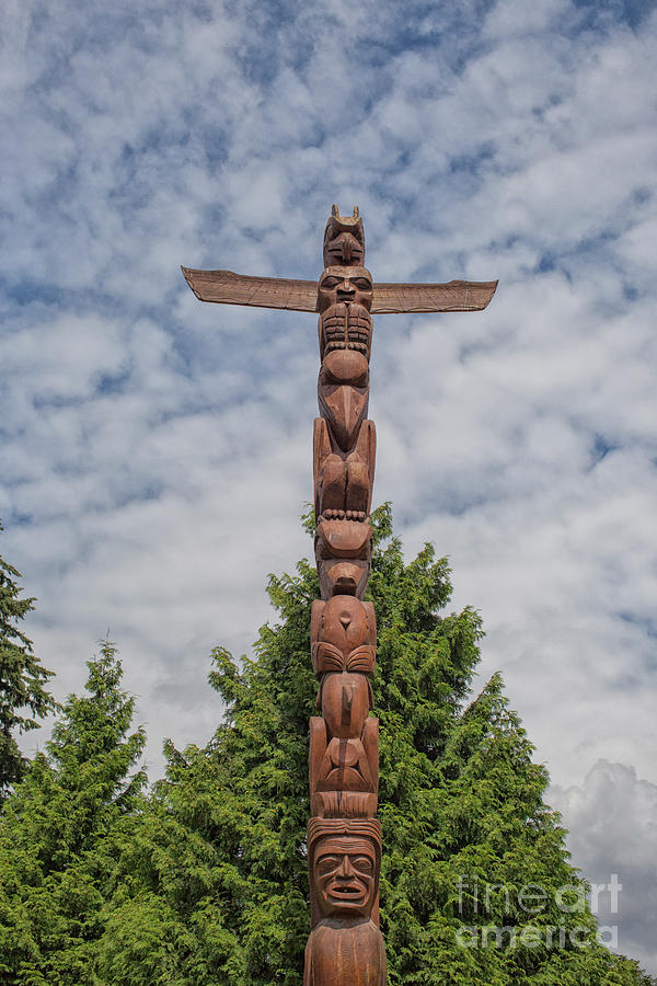Stanley Park Totem poles in Vancouver, Canada Photograph by Patricia Hofmeester