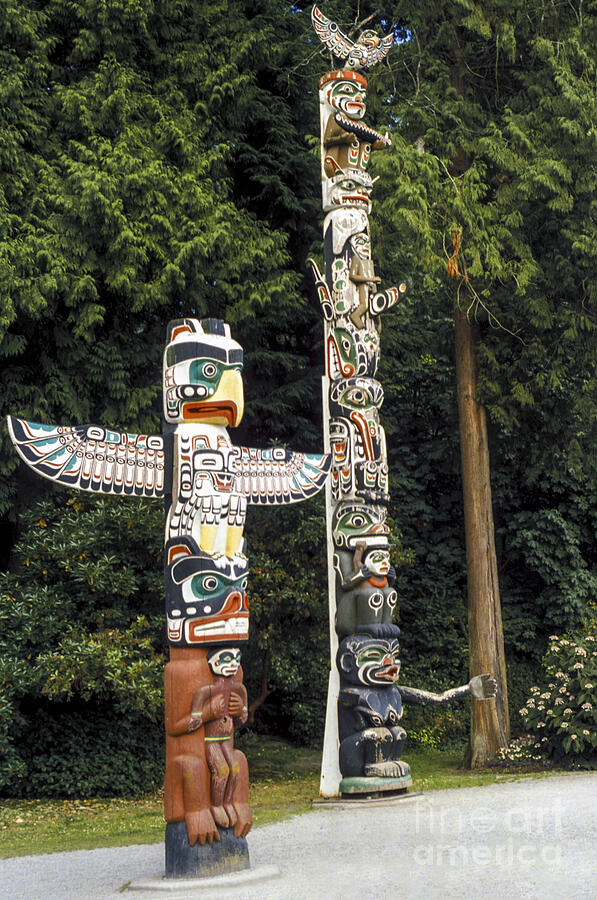 Totem Poles at Brockton Point Photograph by Bob Phillips