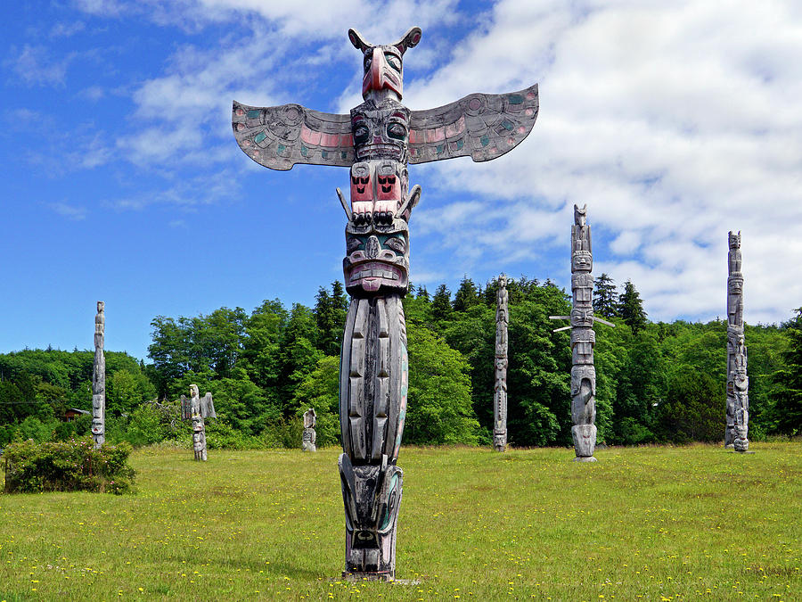 Totem Poles in Color Photograph by Inge Riis McDonald