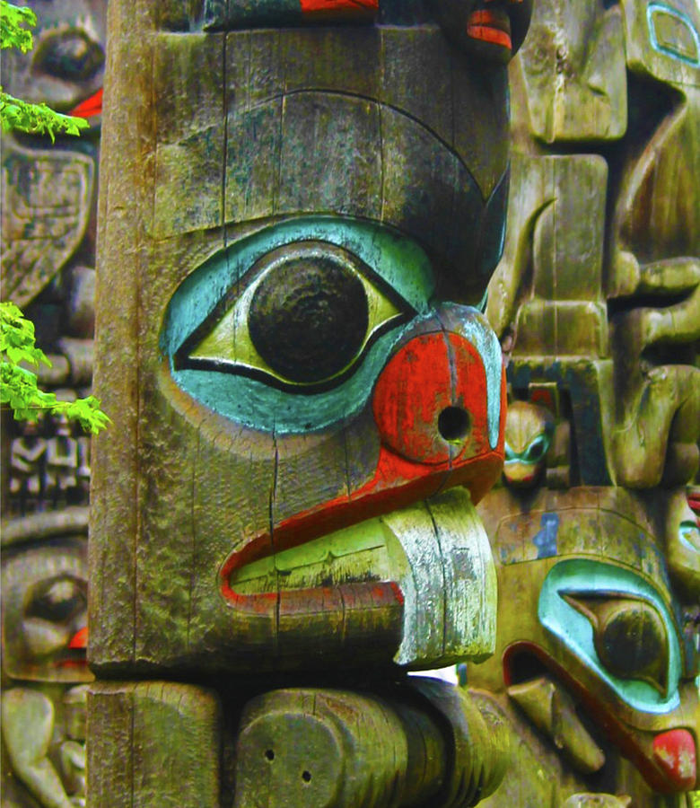 Totem Poles Photograph by Rod Whyte