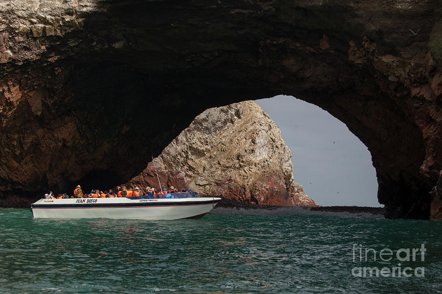 Tourist boat at the Islas Ballestas Photograph by Patricia Hofmeester