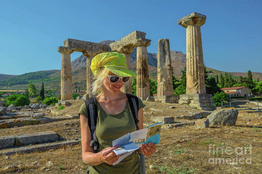 Tourist in Ancient Corinth Photograph by Benny Marty