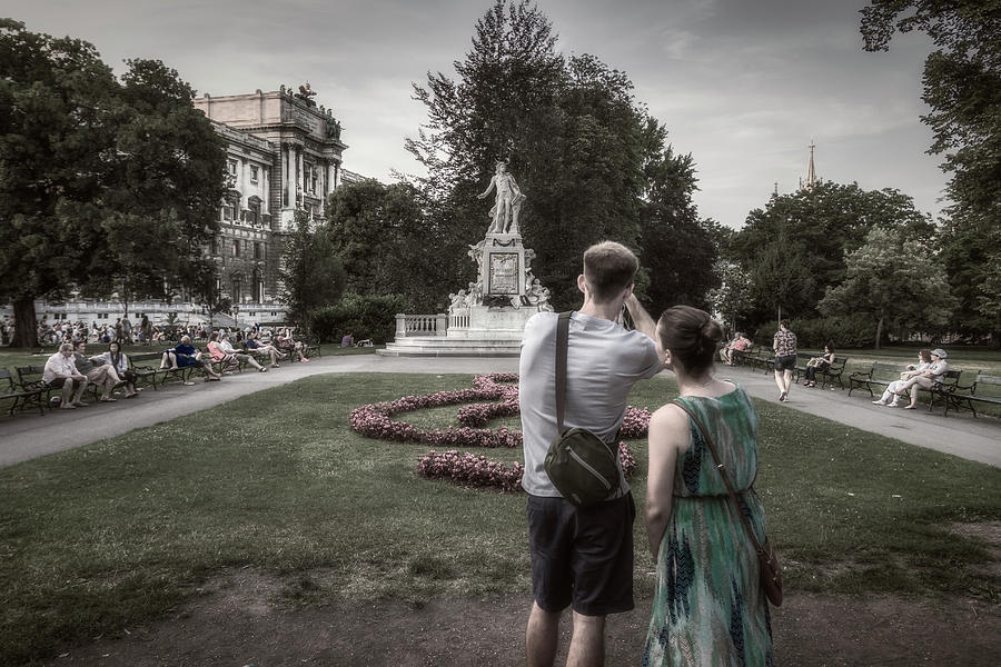 Tourists at Mozart Memorial Photograph by Roberto Pagani