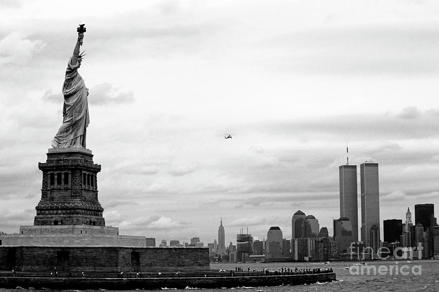 Tourists visiting the Statue of Liberty Photograph by Sami Sarkis