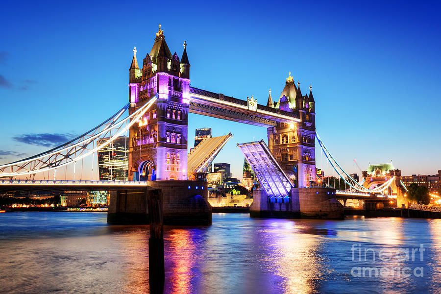 Tower Bridge in London, the UK. Night lights at late sunset Photograph by Michal Bednarek