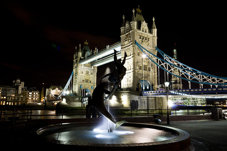Tower Bridge With Girl and Dolphin Statue Photograph by David Pyatt