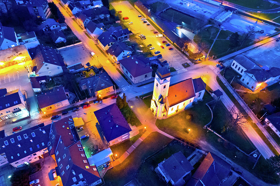 Town of Krizevci church and square aerial night view Photograph by Brch Photography