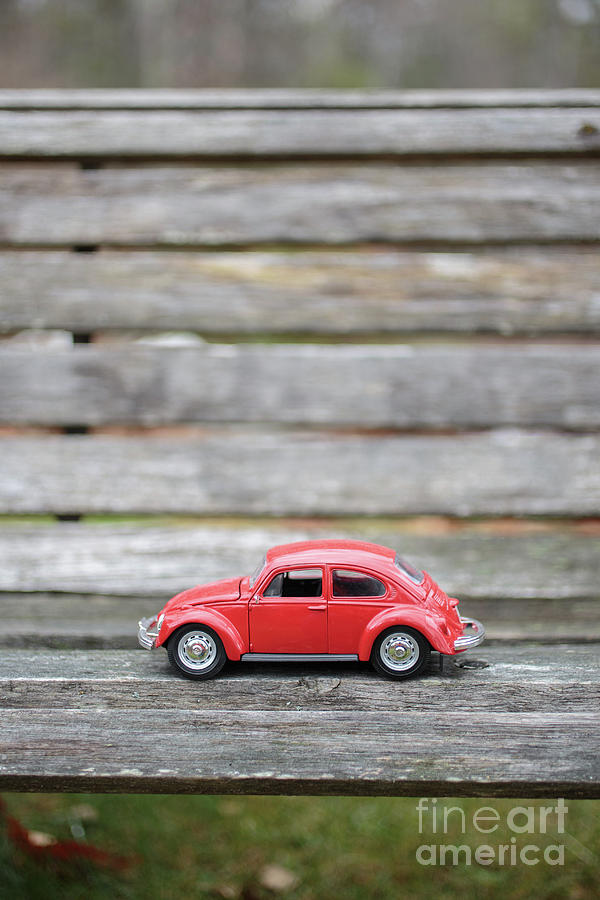 Toy Car on a bench Photograph by Edward Fielding