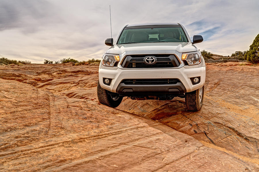 Toyota Tacoma at Arches Photograph by Brett Engle