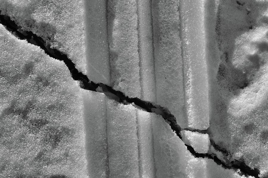 Tracks In The Snow And A Crack In The Ice BW  Photograph by Lyle Crump