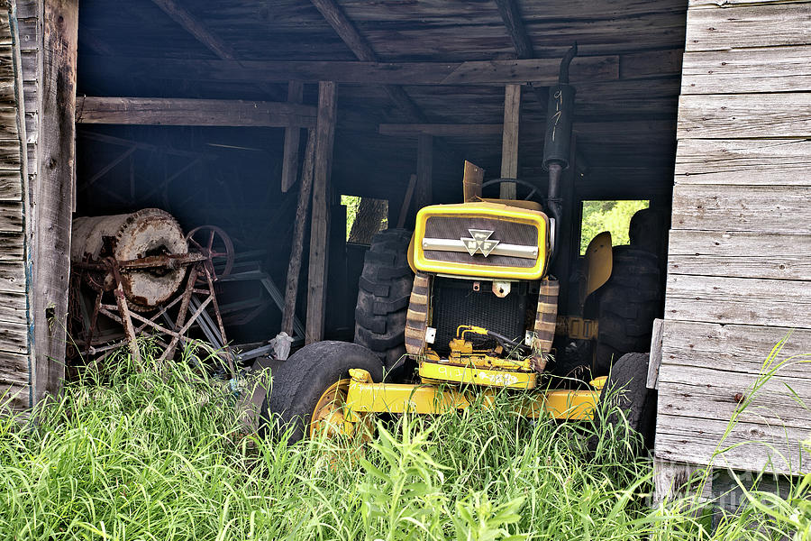 Tractor And Equipment In Abandoned Barn Photograph