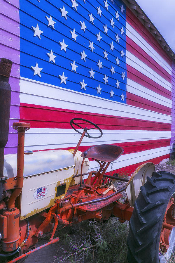 Barn Photograph - Tractor And Large Flag by Garry Gay