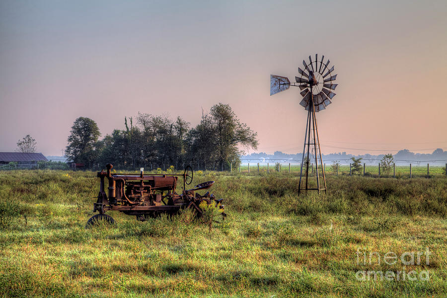 Driving Photograph - Tractor By A Windmill by Larry Braun Driving Photograph - Tractor By A Windmill by Larry Braun